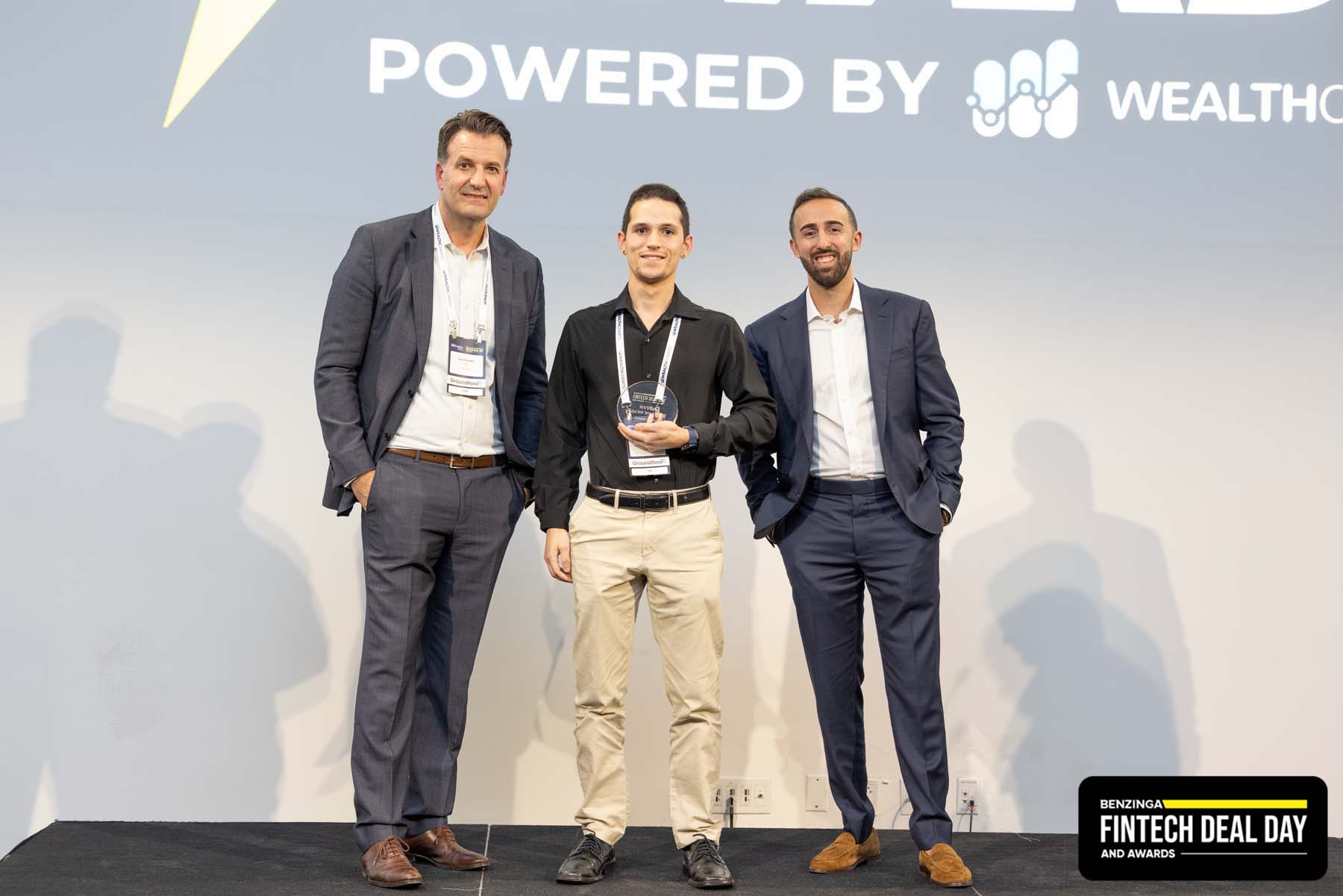NVSTly Accepting Benzinga Award